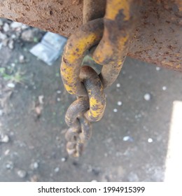 Rusty Iron Chain To Lock The Tailgate Door.