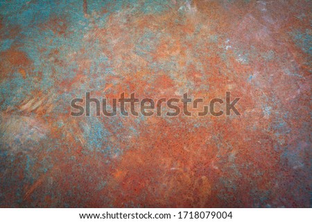 Rusty iron. The texture of the old rusty metal sheet. Closeup.