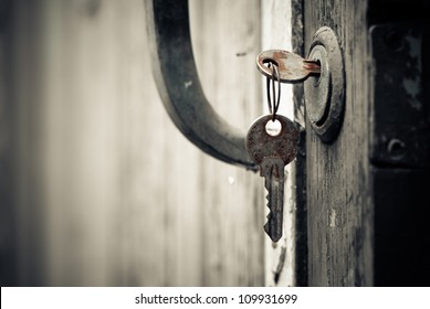 rusty keys in old door lock