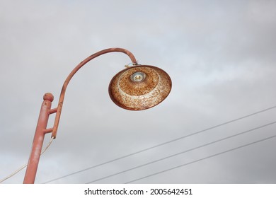 rusty lamp post and not maintained