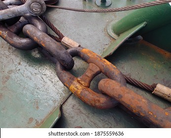 Rusty Marine Chain. This is a photo of marine chain with light rust on the surface while the ship is anchored