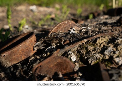 Rusty Metal Can In The Toss Hall Where Ash And Coal Are Left From The Fire