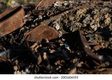 Rusty Metal Can In The Toss Hall Where Ash And Coal Are Left From The Fire