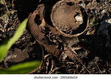 Rusty Metal Can In The Toss Hall Where Ash And Coal Are Left From The Fire