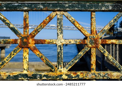 Rusty metal fence near ocean. rusty metal patterns. Metal corrosion. San Fransisco shore. Closeup. - Powered by Shutterstock