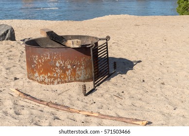 Rusty Metal Firepit On Beach