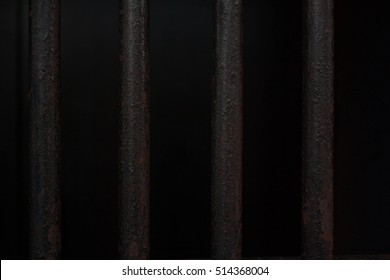 Rusty Metal Jail Bars Clipped Out On Black.