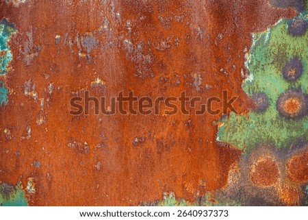 Rusty metal surface texture with peeling green paint showing corrosion pattern