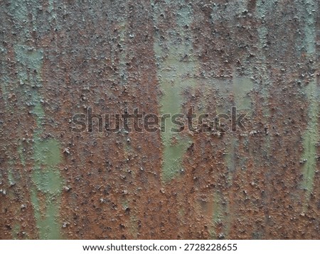 Rusty Metal Texture Background with Corroded Surface and Green Paint
