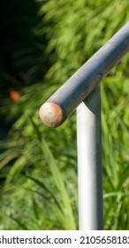 Rusty Metallic Bannister In A Park