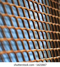 Rusty metallic net. Short depth-of-field.