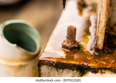 Rusty Nut And Bolt Corrosive From Acid Rain Water Humidity Destroying Structure And Strength.