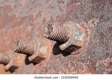 Rusty Nuts And Bolts On An Old Metal Structure.