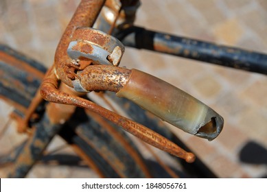 Rusty old bicycle close up, detail handlebars