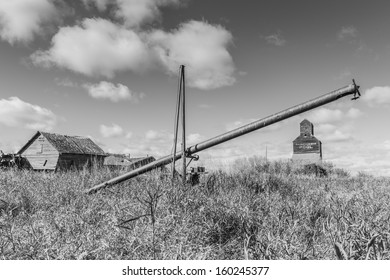 A Rusty Old Grain Auger In An Old Ghost Town