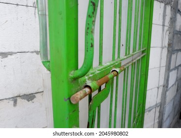 Rusty And Old Green Door Fence