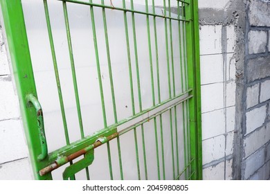 Rusty And Old Green Door Fence