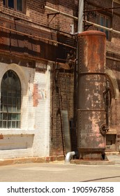 Rusty Old Industrial Furnace Outside Of Carriageworks In Redfern, Sydney, Australia