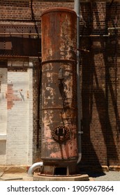 Rusty Old Industrial Furnace Outside Of Carriageworks In Redfern, Sydney, Australia