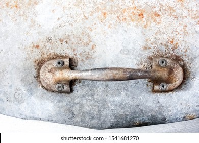 Rusty old iron texture, Old metal handle door, Rusty old iron background, Antique handle that is decaying and rusting, Door handles on iron plate, Rusty iron background with door handle - Shutterstock ID 1541681270