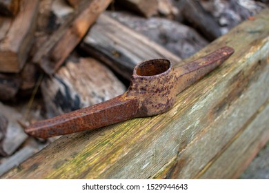 A Rusty Old Pick Axe Head