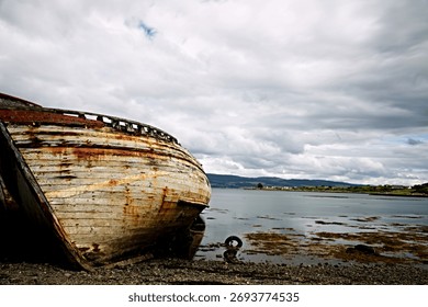 A rusty old ship on the Mull Coast of Lock Lake in Scotland