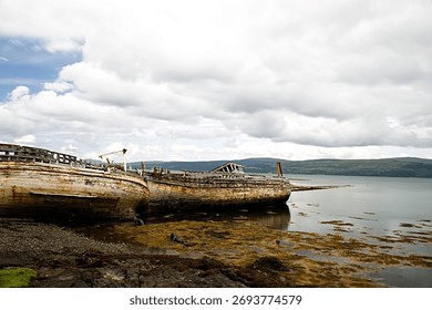 A rusty old ship on the Mull Coast of Lock Lake in Scotland
