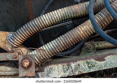 Rusty Old Spring. Part Of Agricultural Machinery. Steampunk Style