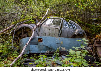 Rusty Old Vintage Cars, Some With Missing Doors And Windows, Bastnäs, Car Cemetry, Damaged Cars In Sweden Close To Norway