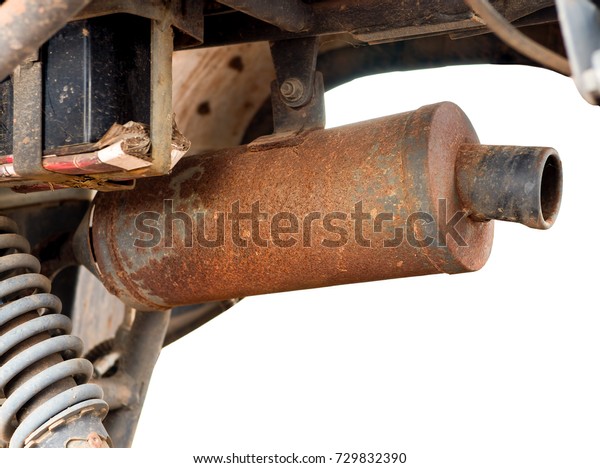 Rusty on exhaust car. Close up of old muffler car,\
exhaust pipe isolate on white background. Problem of environmental\
pollution by transport emissions. Ecology air pollution concept. -\
Selective focus