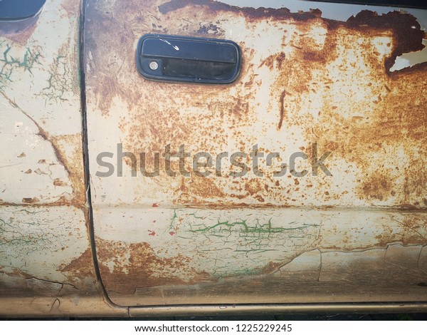 rusty outside car door, old\
car