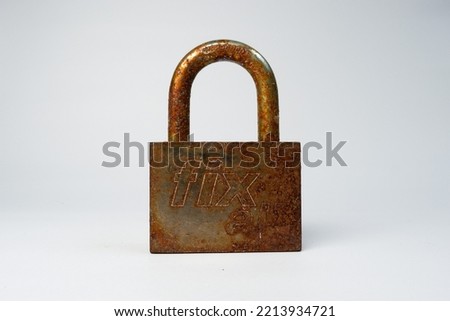 Rusty padlock isolated with white background