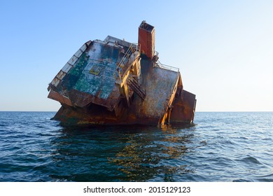 The Rusty Part Of A Stranded Ship In The Open Sea