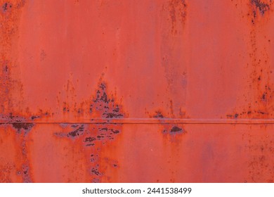 rusty red painted flat sheet metal surface full-frame background and texture.