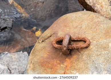 rusty ring in the stone