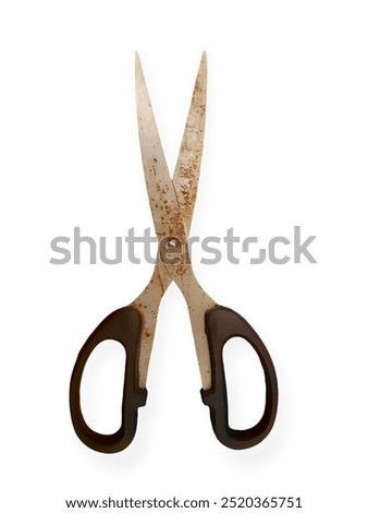 rusty scissors with black handles on a white background