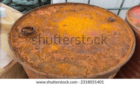 Rusty, Scrapped Barrels In The Port.