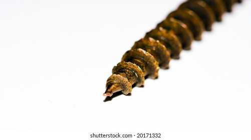 Rusty screw macro isolated on white