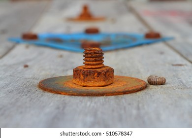 Rusty Screw On Wood