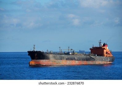 Rusty Ship On The Ocean