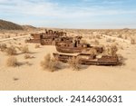 Rusty ships at the ship graveyard in former Aral sea port town Moynaq (Mo ynoq or Muynak), Uzbekistan