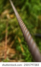 rusty sling cable with blur background
