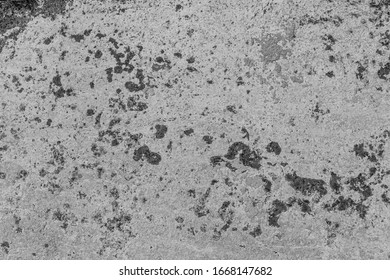 Rusty smudge wall cellar farm house. Dirty exterior urban facade. Black white ruined structure background. Grunge uneven old stone rock texture. Outside corroded crashed cement mortar for 3d design - Powered by Shutterstock