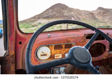 Rusty steering wheel of the old broken car