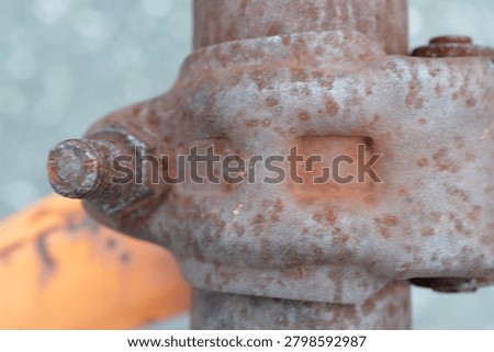 Rusty Threaded Bolt Detail on Industrial Metal Fitting