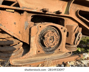 Rusty train bogie wheel axle and spring industrial detail
Detailed close up of rusty train bogie with wheel axle and spring. Old industrial metal mechanism texture.