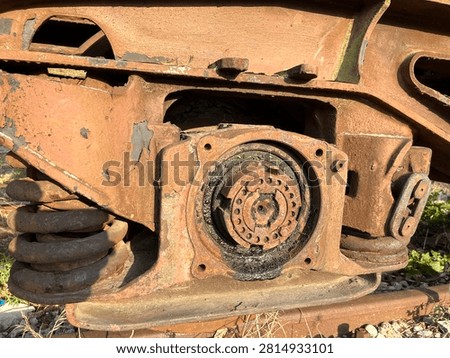 Rusty train bogie wheel axle and spring industrial detail
Detailed close up of rusty train bogie with wheel axle and spring. Old industrial metal mechanism texture.