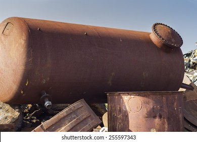 Rusty Underground Storage Tank On Junkyard. Ready For Recycling.