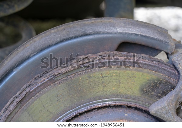 Rusty and\
used very much car brake wait for\
service.