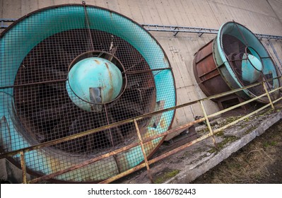 Rusty Ventilators On An Abandoned Industrial Site